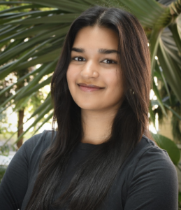 A woman smiling. 